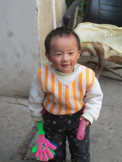 The 18 month old son of our security  man in our complex. He knows us by 