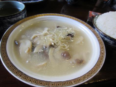 Various kinds of mushrooms in a broth